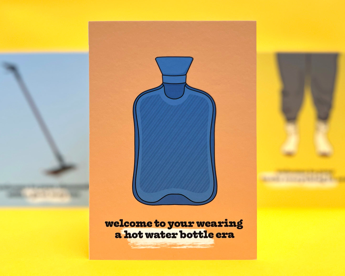 Wearing a Hot Water Bottle Era A6 Birthday Card With Badge